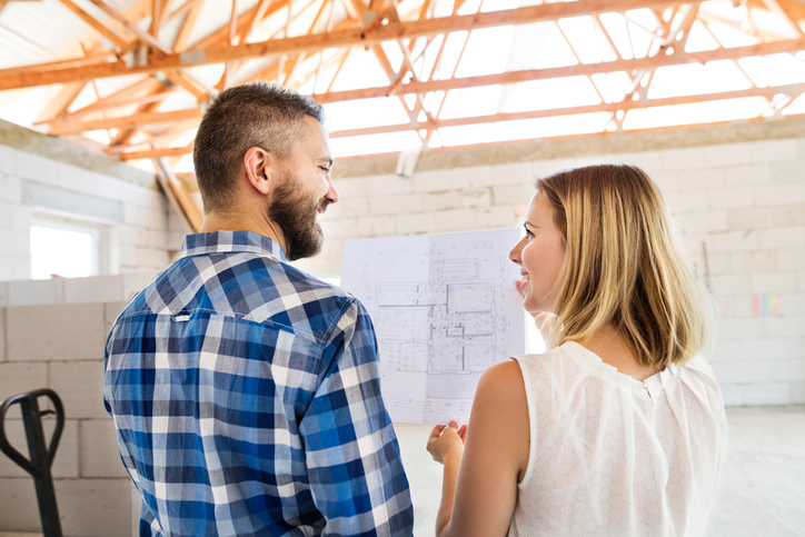 Young Couple Building Home