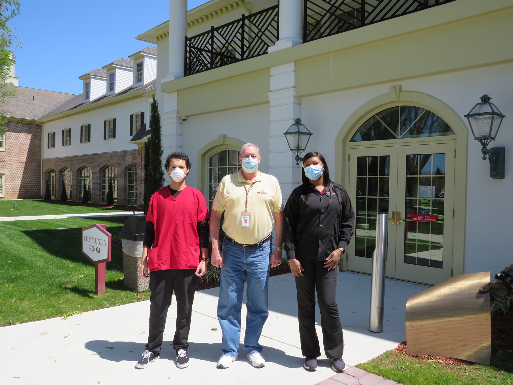 American Heritage Credit Union Chief Operating Officer Scott McCaw (Center), poses with American Red Cross associates prior to donating blood at American Heritage’s recent community blood drive.