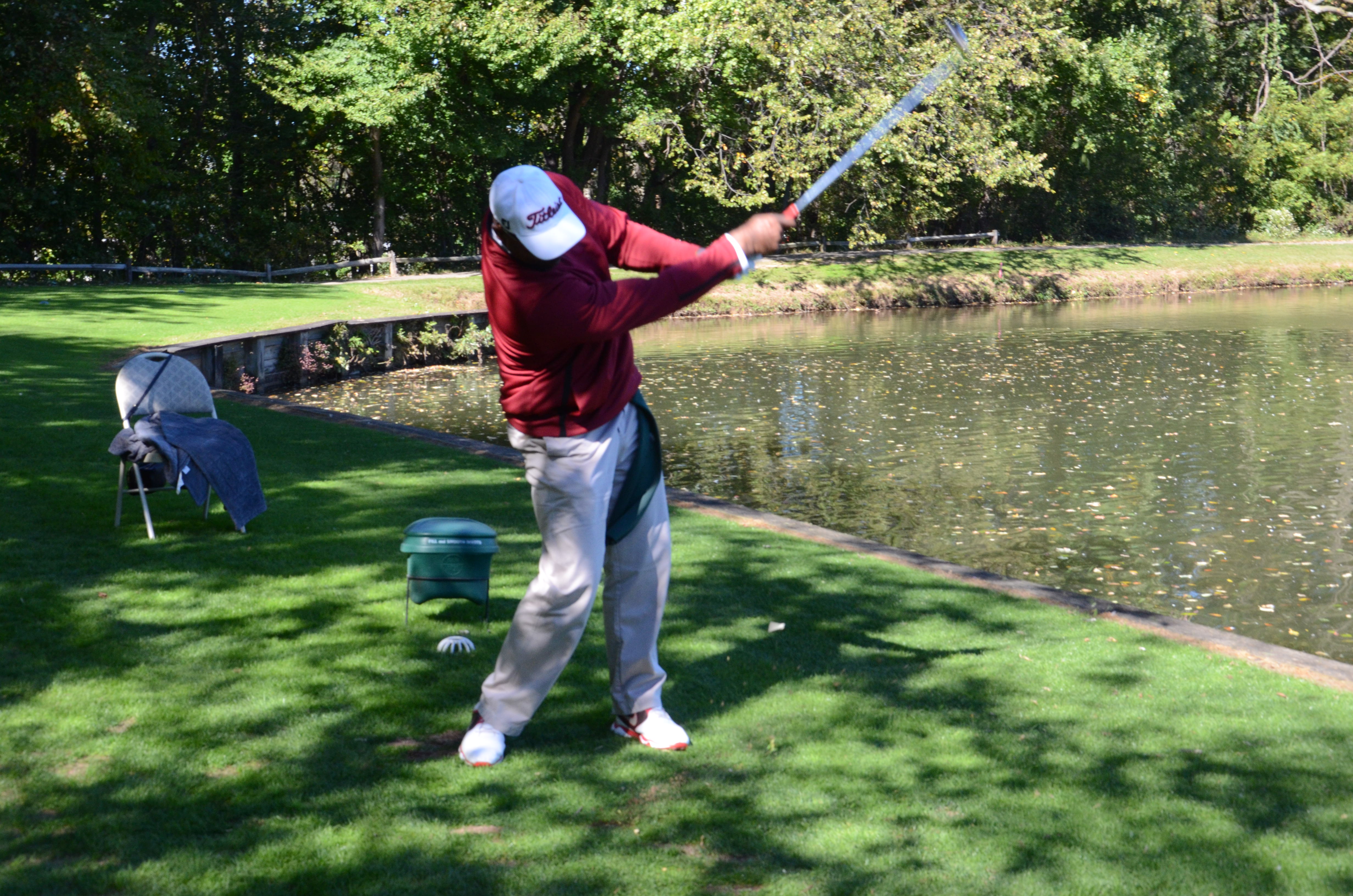 Man making a golf swing