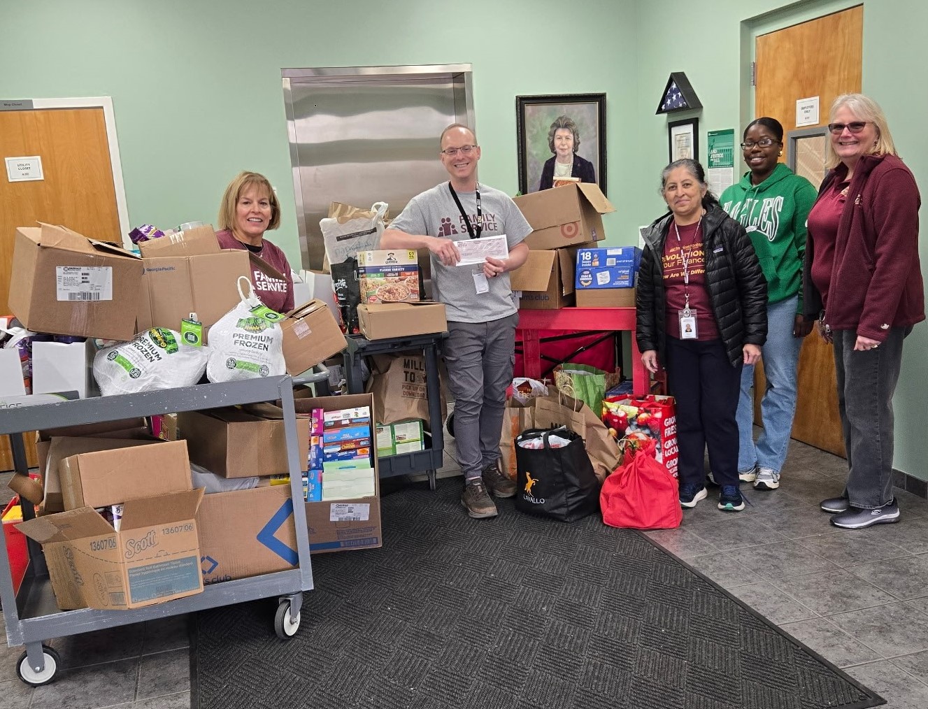 American Heritage Associates Donating Food to a Local Food Pantry