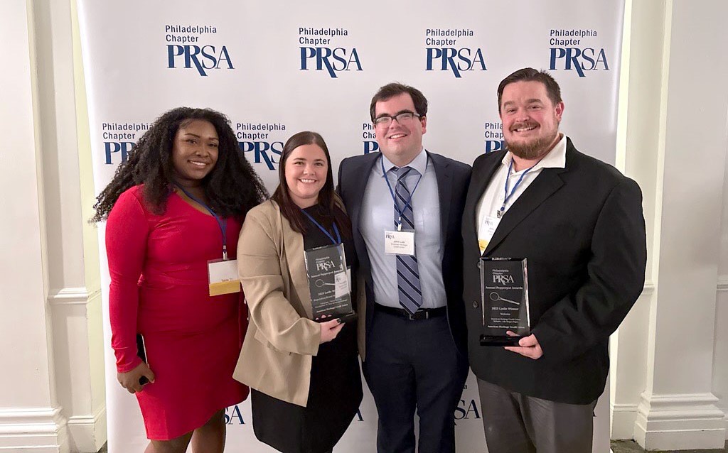 American Heritage's Marketing Team with two 2025 Pepperpot Awards