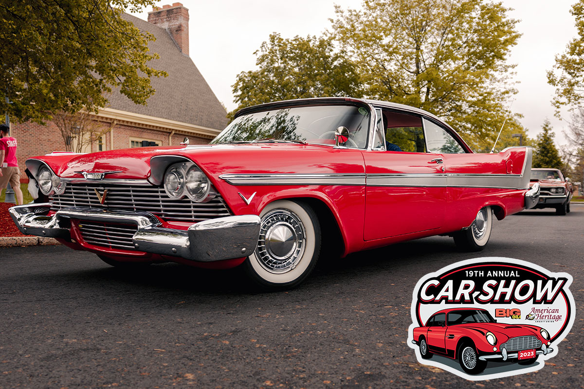 Red Antique Car with 19th Annual Car Show logo