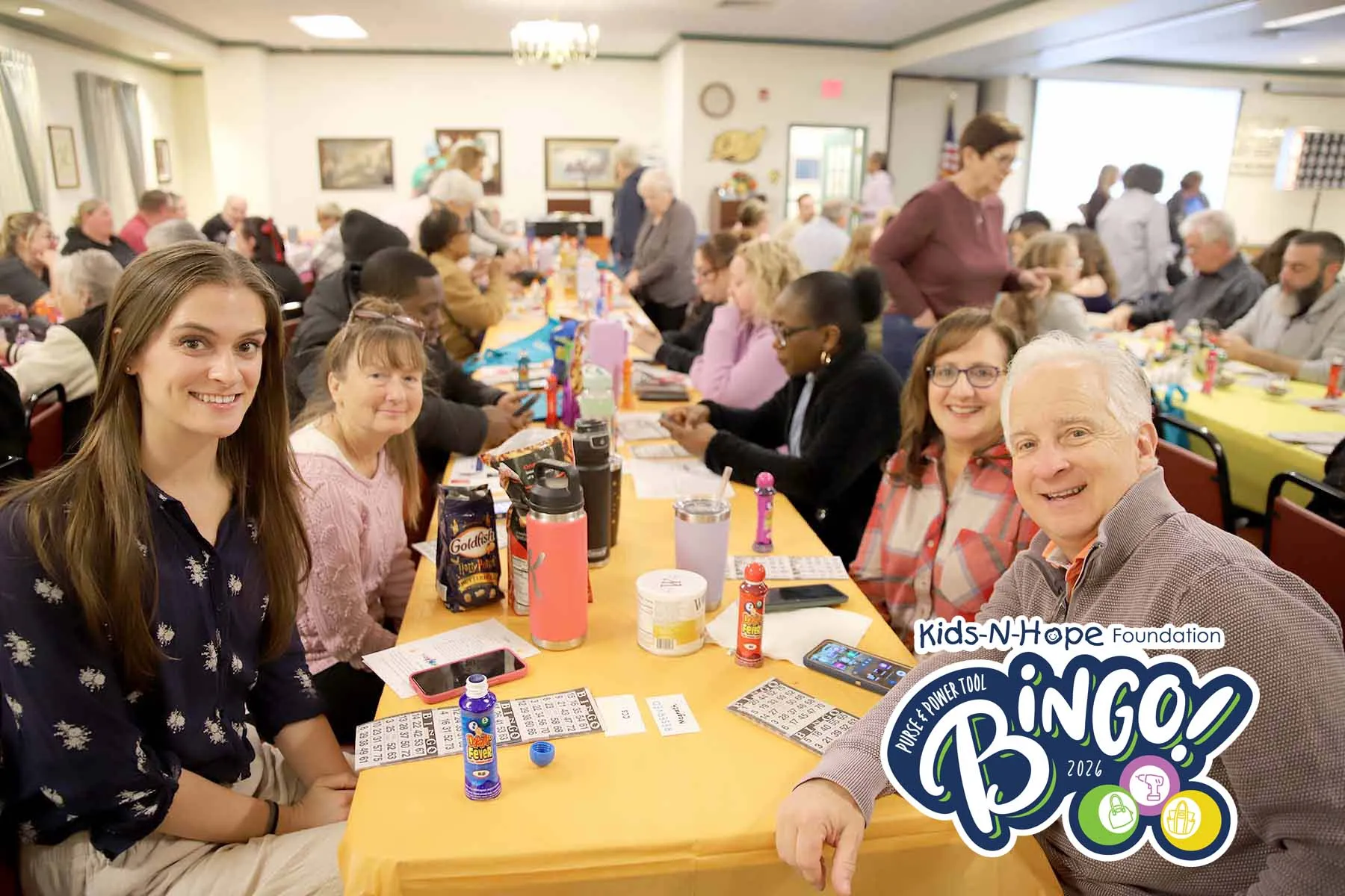 Group playing bingo at the Kids-N-Hope Purse and Power Tool Bingo